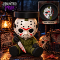Jason candle holder with white hockey mask, green clothing, and machete, with decorated tray detail